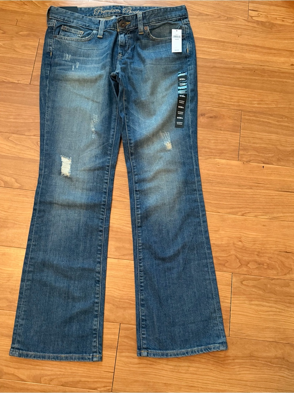 GAP Women's Distressed Bootcut Jeans in Medium Blue